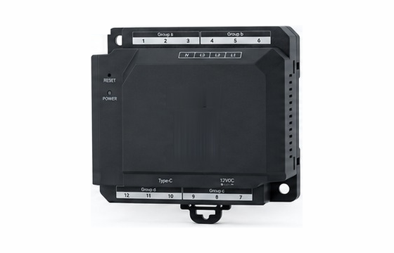 A multi-channel current monitoring controller with terminal blocks along its edges.